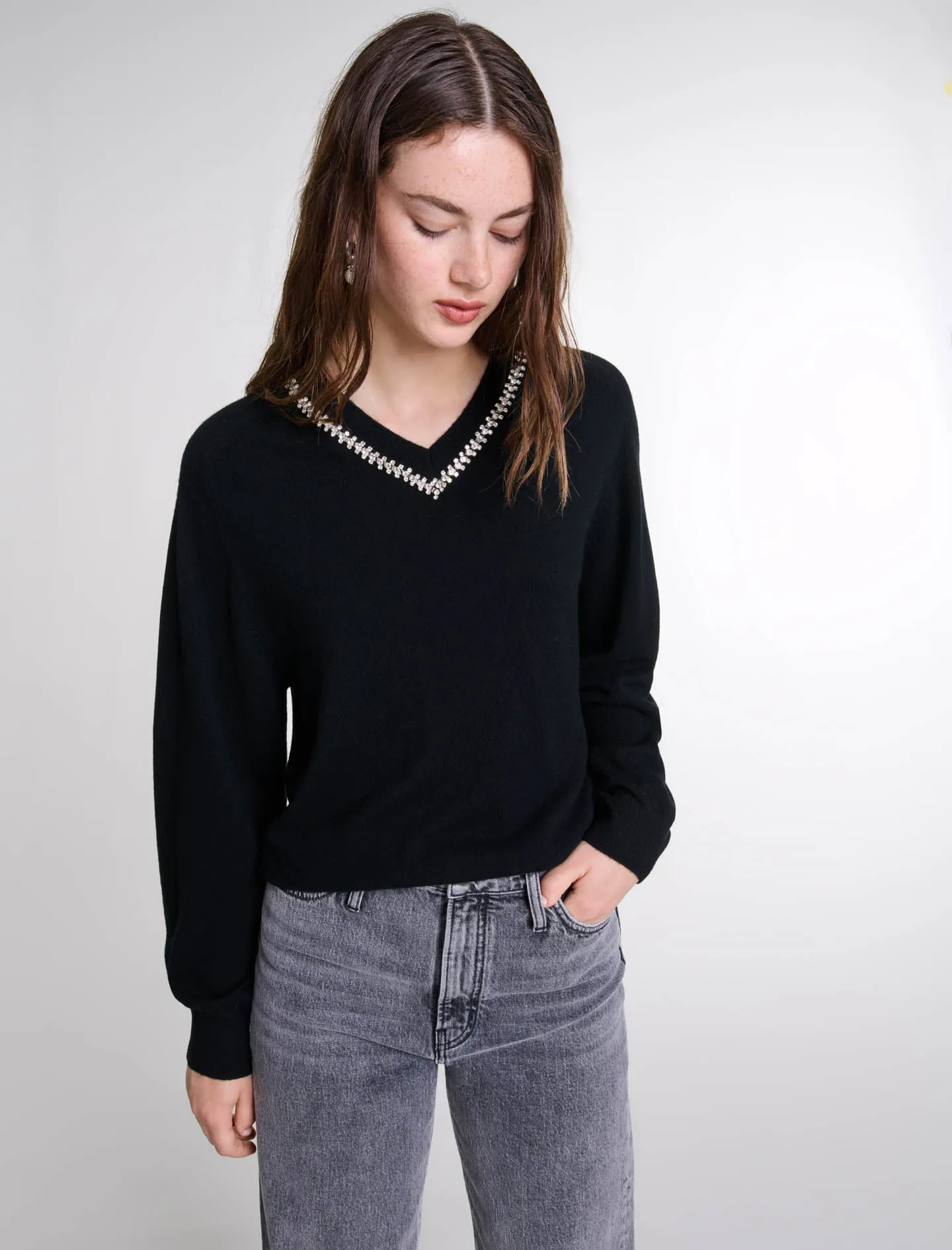 Knit jumper with rhinestone neck